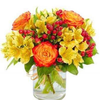 Capture the essence of spring with this wonderfully vibrant collection of flowers that will brighten anyone's day. A perfect way to let someone know you're thinking of them, send them the gift of brightly colored flowers that will make them smile!