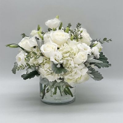 If you're looking for the perfect gift in a dazzling array of white flowers, then look no further as this arrangement is guaranteed to turn heads and make your recipient smile.