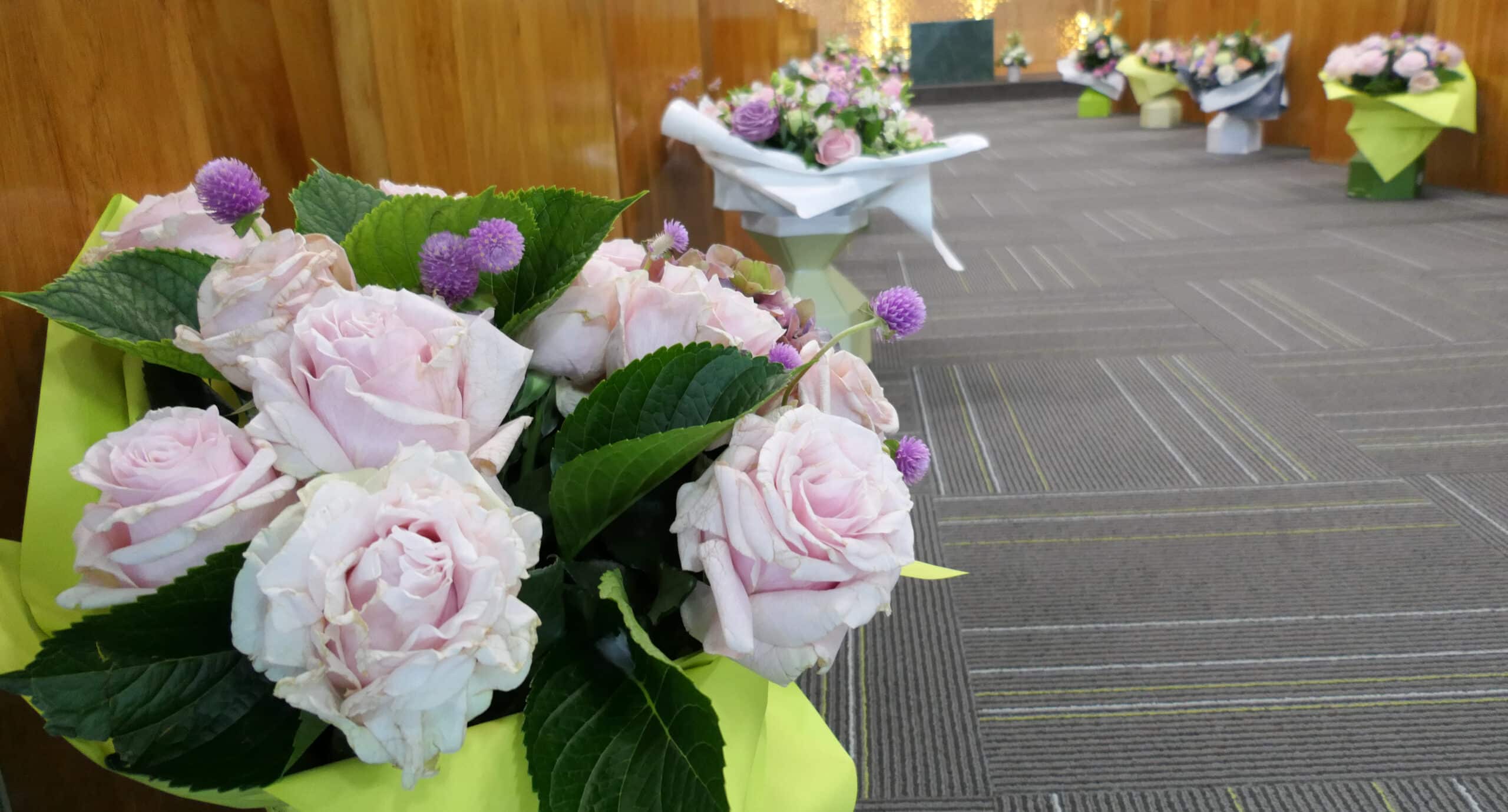 flower and candle at funeral